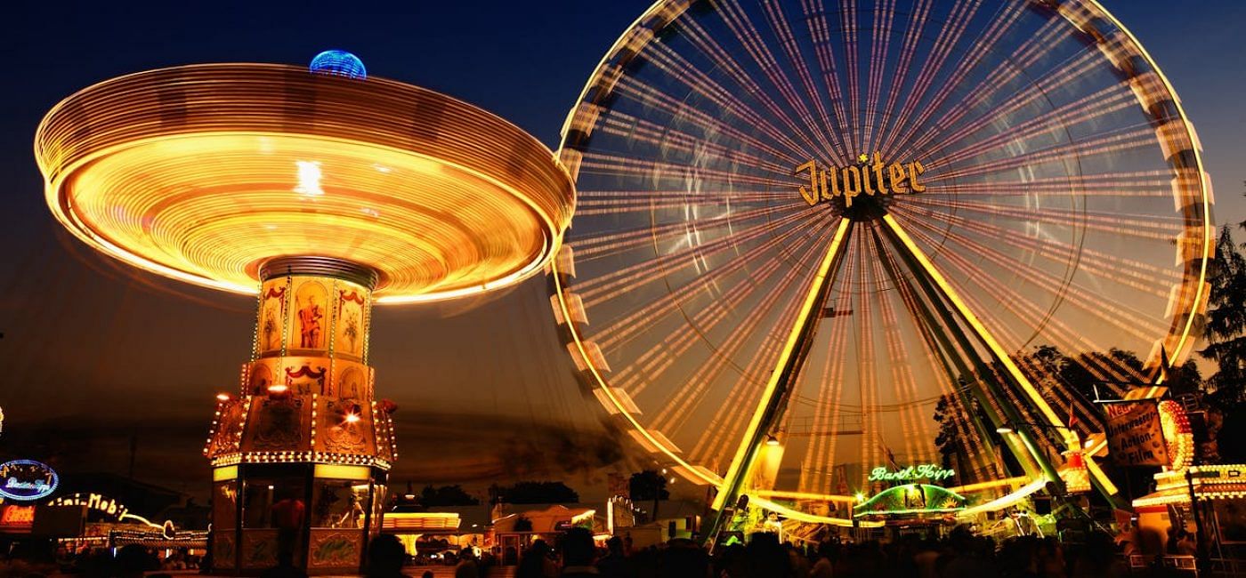 Time Lapse Photo of Circus Rides at Night